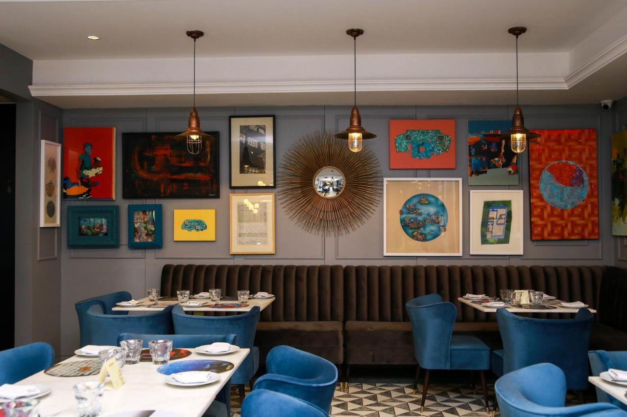 Ambiance Boutique Art Hotel Lahore Bagian luar foto Interior of the restaurant