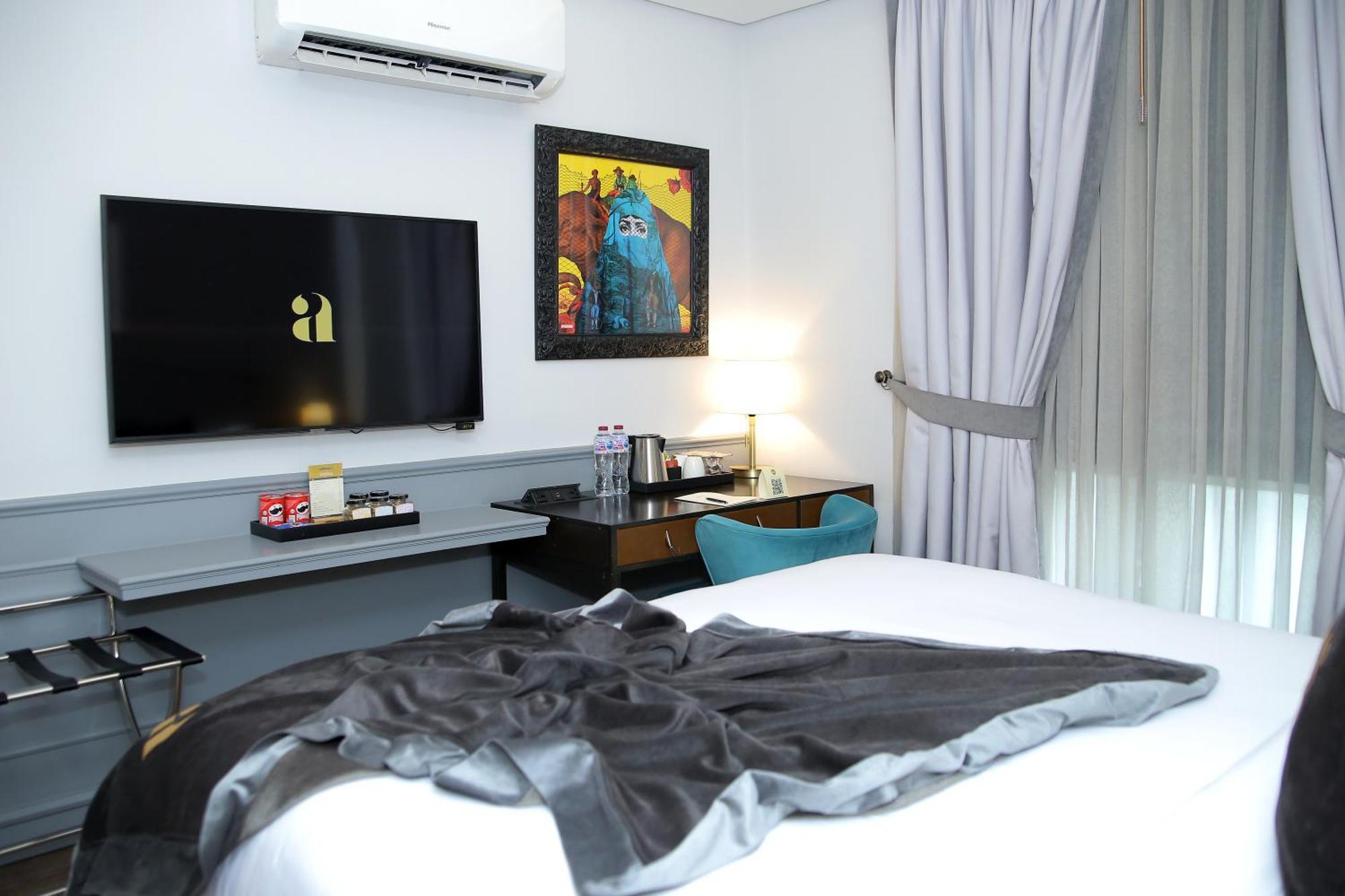 Ambiance Boutique Art Hotel Lahore Bagian luar foto A room at the hotel